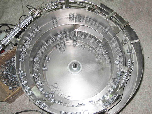 振动盘是一种主动拼装或主动加工机械的辅助送－振动盘价格